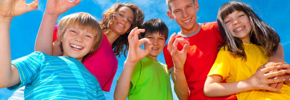 Five happy kids in colorful outfits